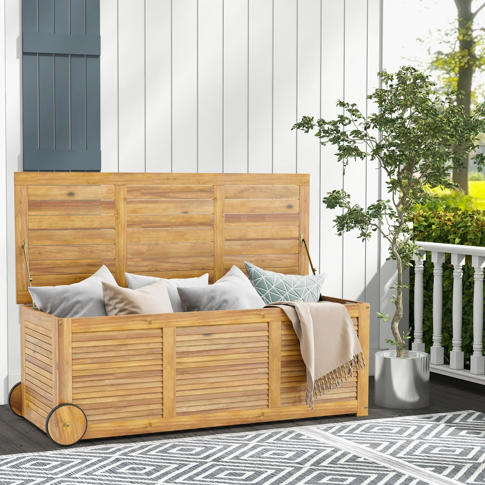 HOMASIS Baúl de jardín 182 l con ruedas madera de acacia impermeable 150 kg carga