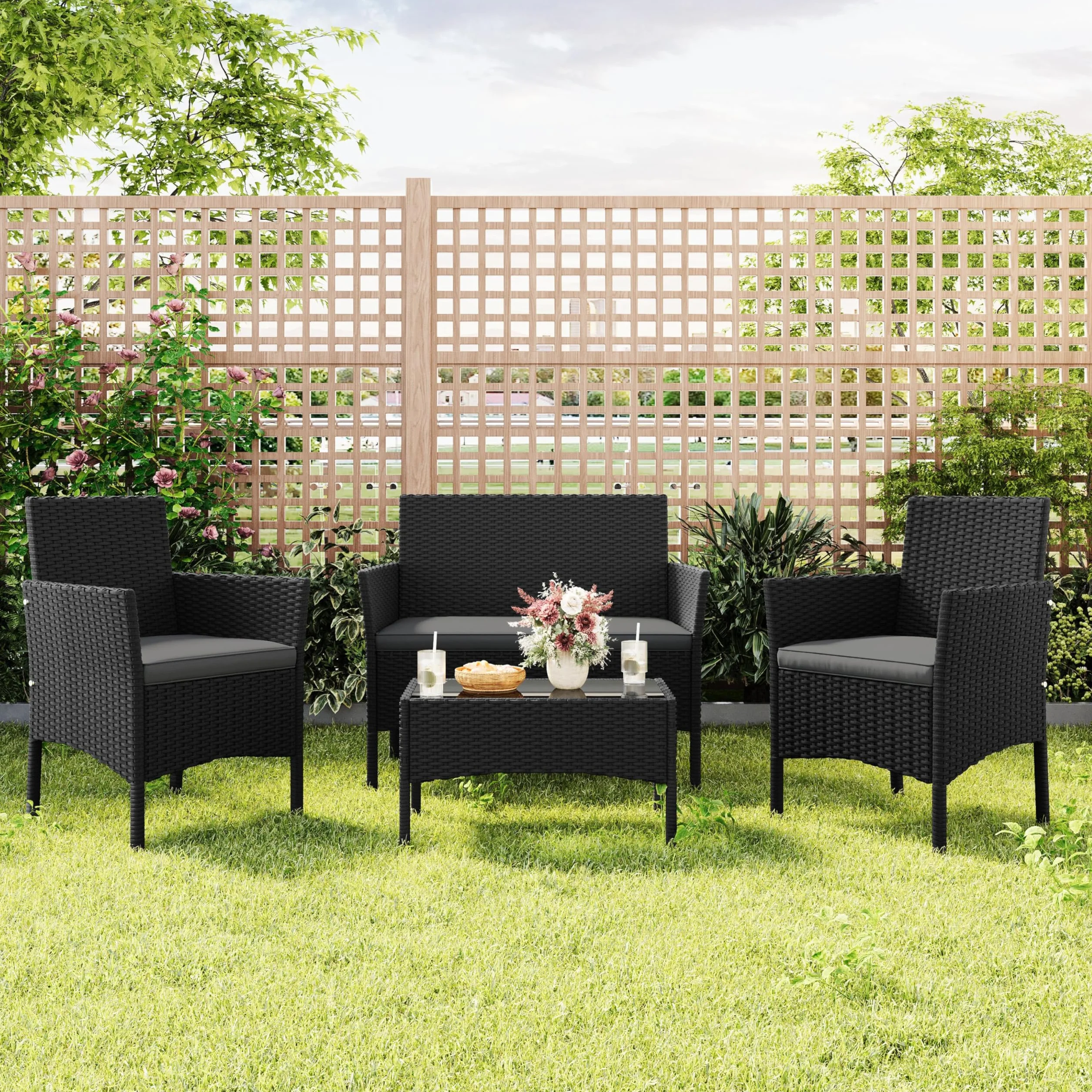 Yaheetech Conjunto Jardín 4 Piezas Muebles Ratán Exterior con Sofá 2 Plazas, Sillones, Cojines y Mesa Vidrio Negro/Gris