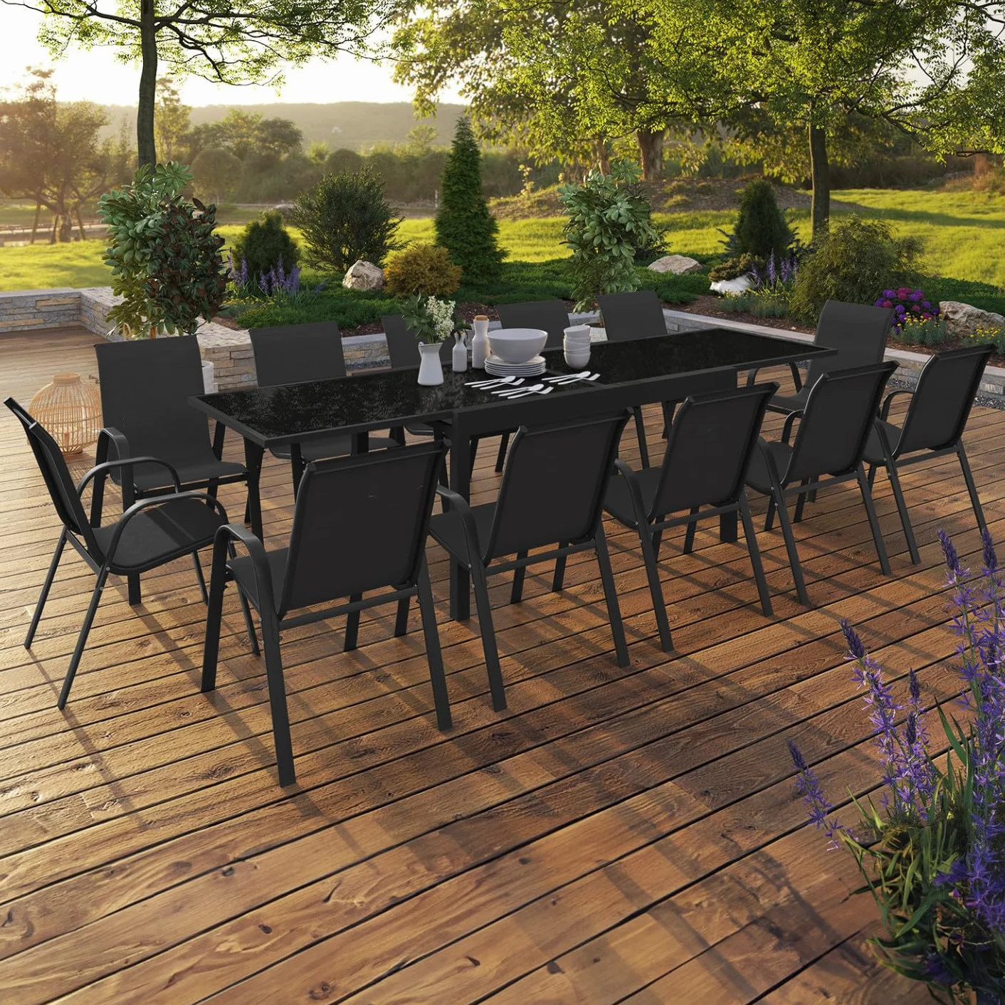 IDMarket - Juego de jardín Madrid con mesa extensible de 135-270 cm y 12 sillas apilables, color negro